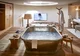 Free-standing bathtub in one of the hotel rooms in Switzerland with television.